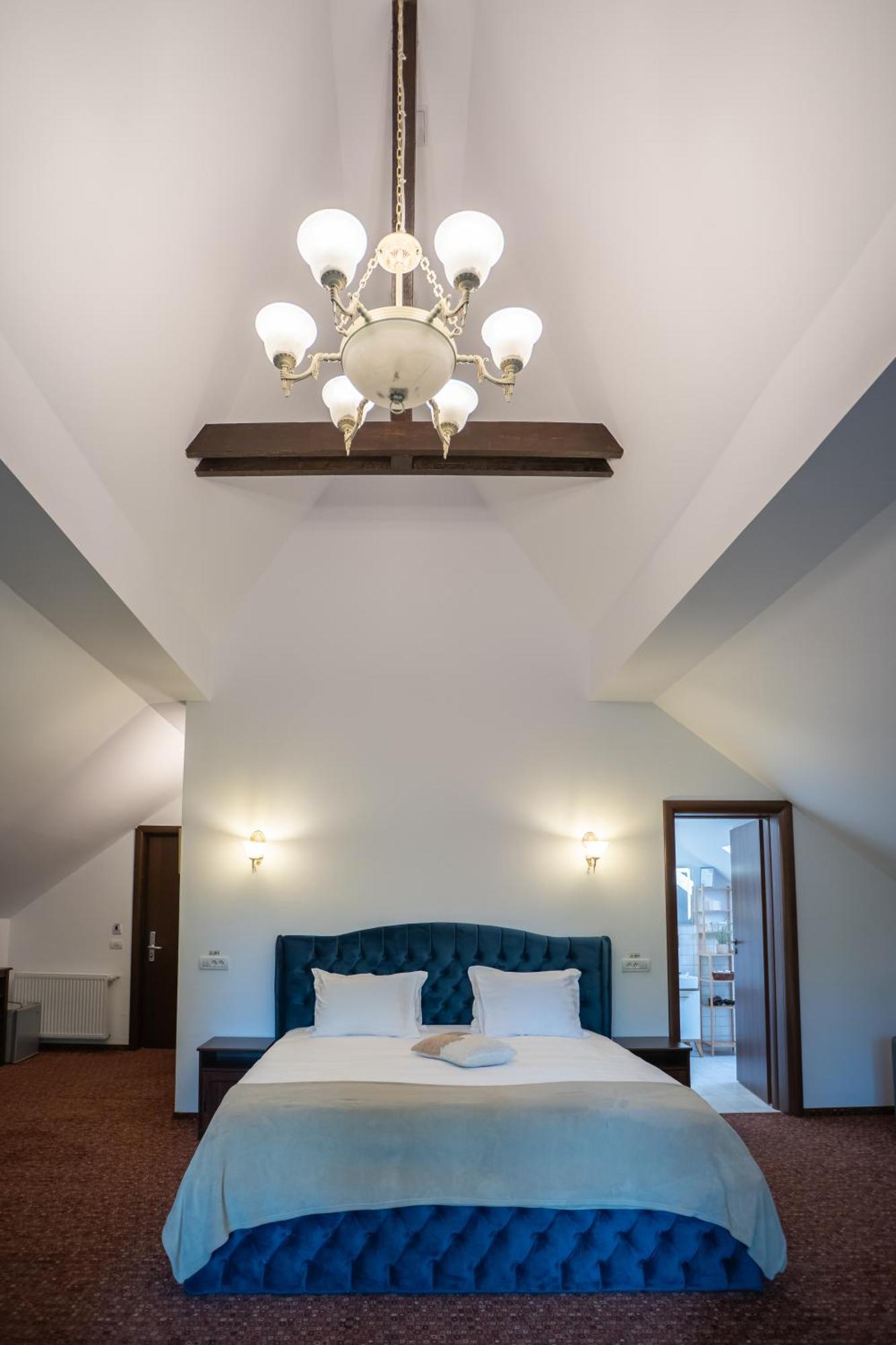 فيلا أوبوس سِنايا المظهر الخارجي الصورة A bedroom at the hotel