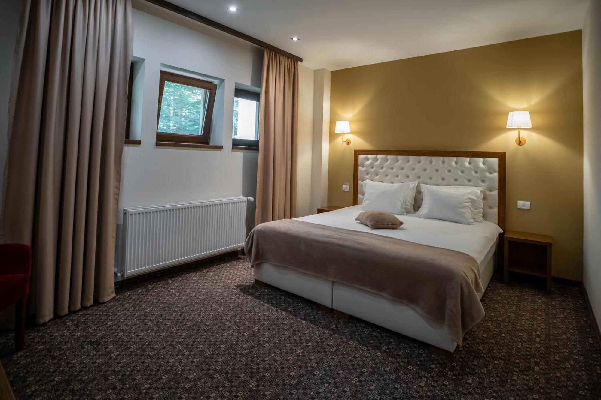 فيلا أوبوس سِنايا المظهر الخارجي الصورة A bedroom in a hotel