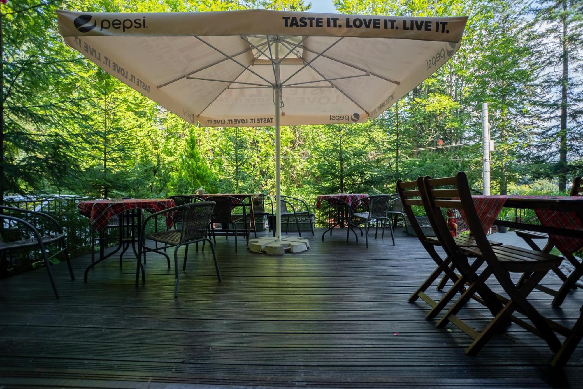 فيلا أوبوس سِنايا المظهر الخارجي الصورة A patio umbrella